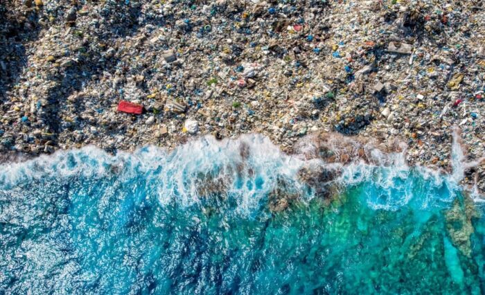 Aerial view of garbage in the ocean.